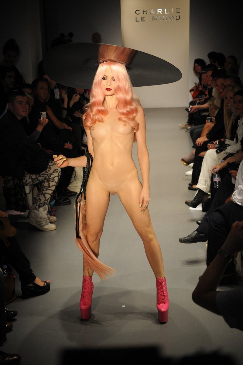 Naked women on the catwalk show themselves