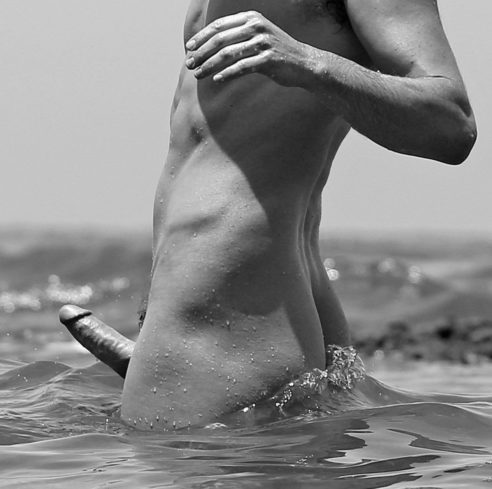 Naked man and woman in water