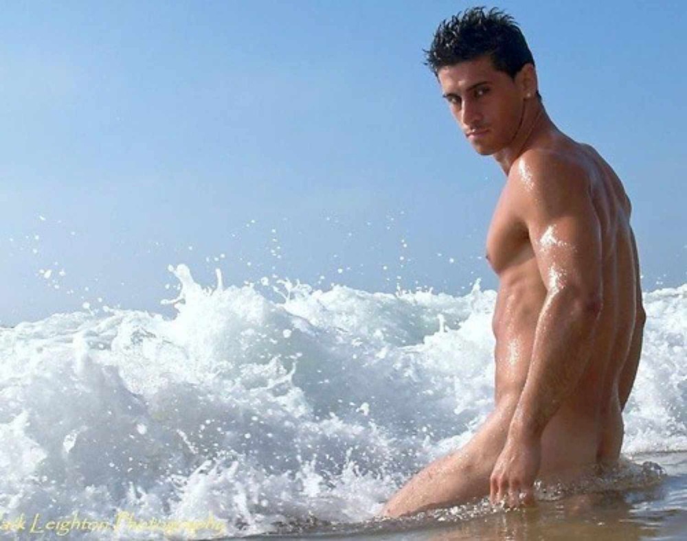 Beautiful naked men on the beach