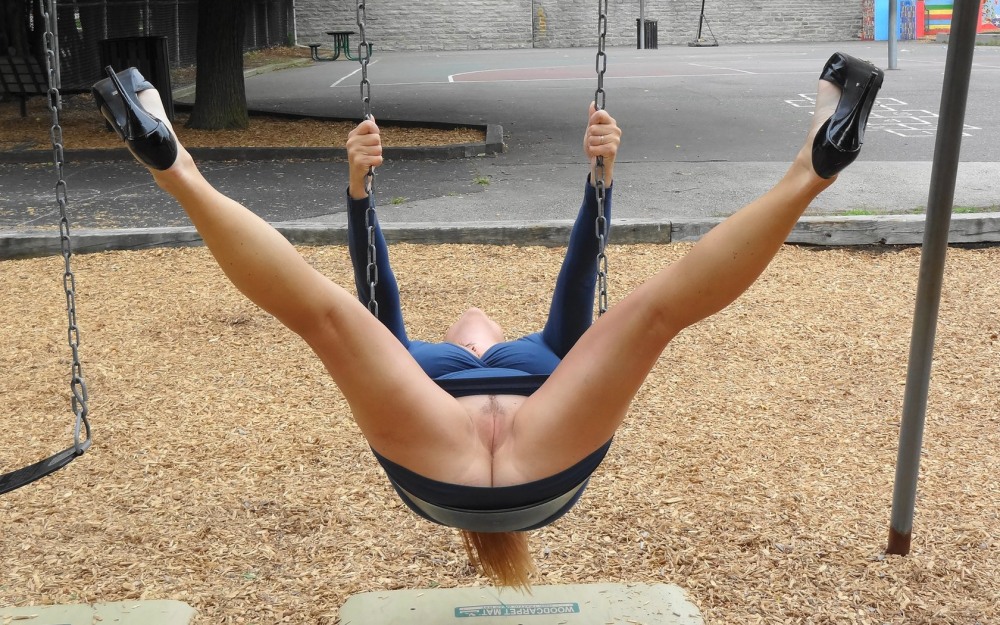 Girl on the horizontal bar without panties