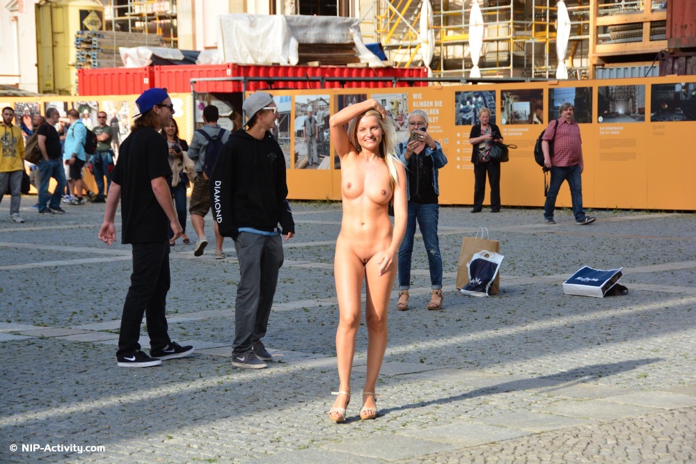 Naked women in crowded places