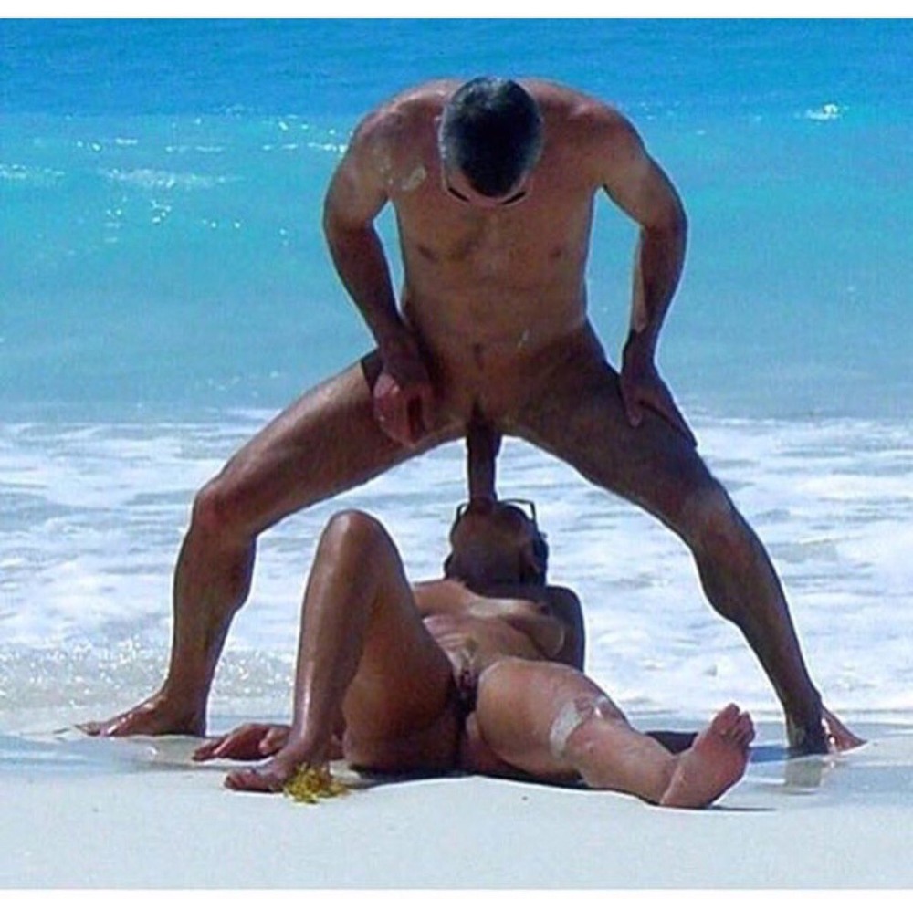 A guy with a huge member on the beach