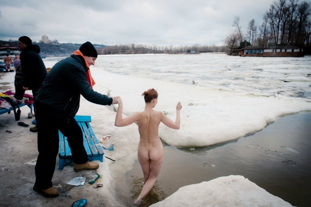 Naked women bathe in the hole