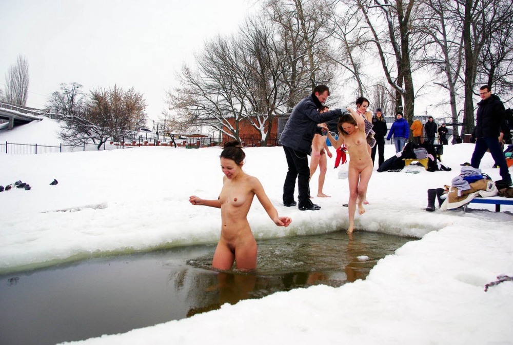 Naked women bathe in the hole