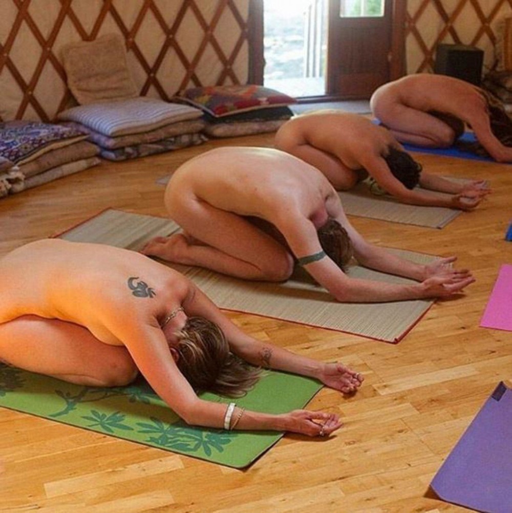 Naked yoga in the nature of nude