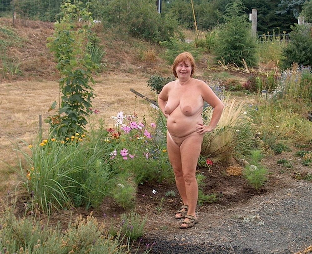 Naked women bathe in the river