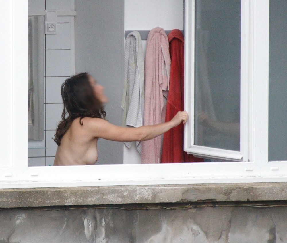 Spied on naked women in neighboring windows