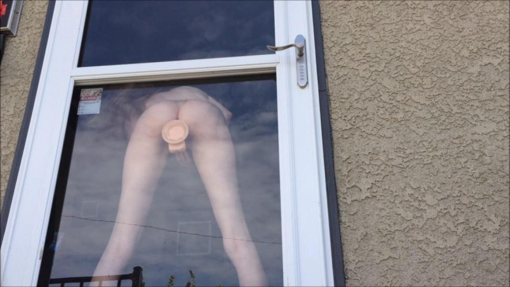 Naked women naked women in the window