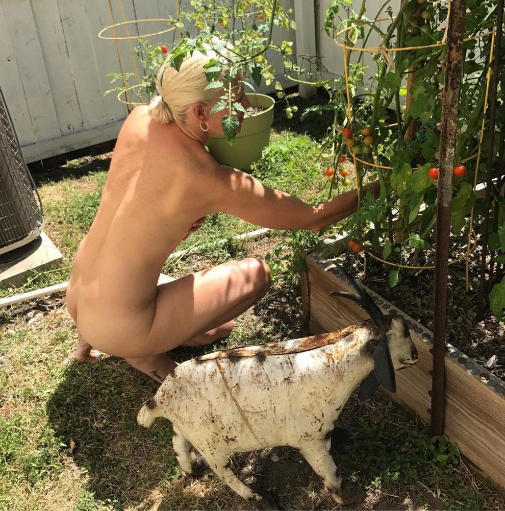 Naked women on the beds of the garden