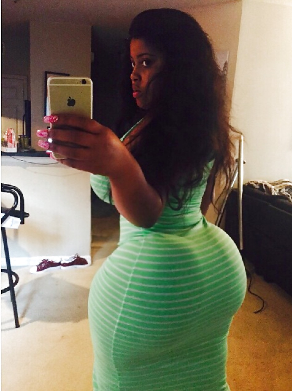 Huge buttocks in a dress