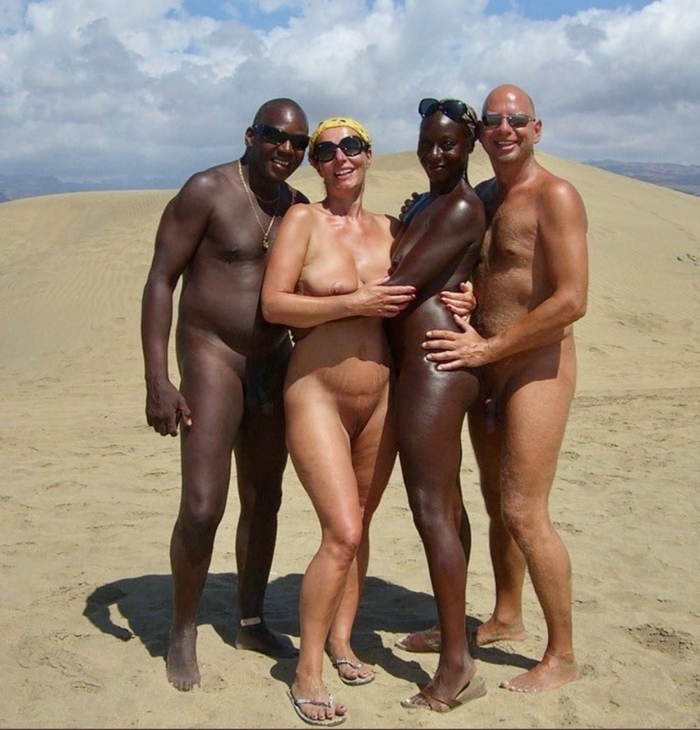 Family nudism on the beach of blacks