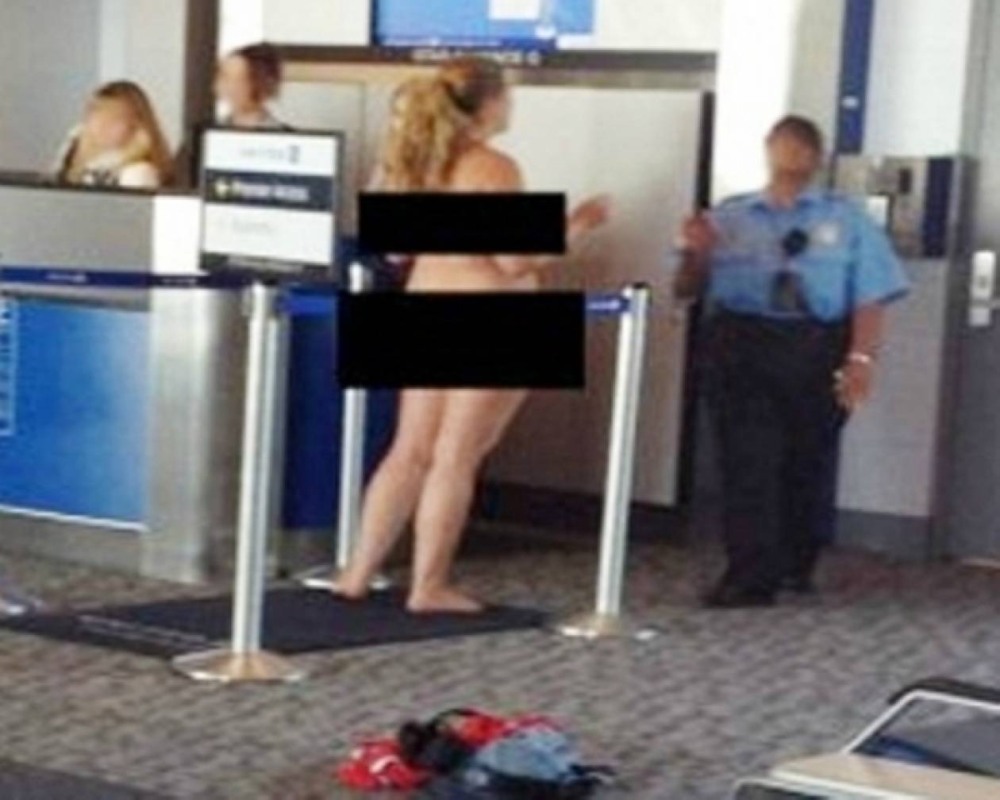 The girl undresses in public