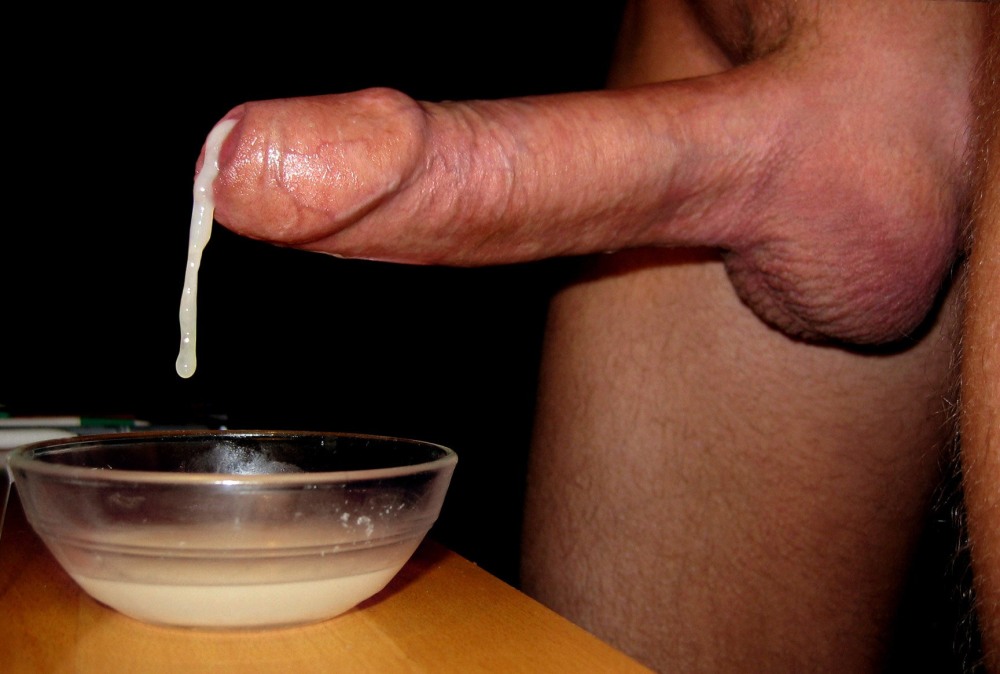 Male penis in condom