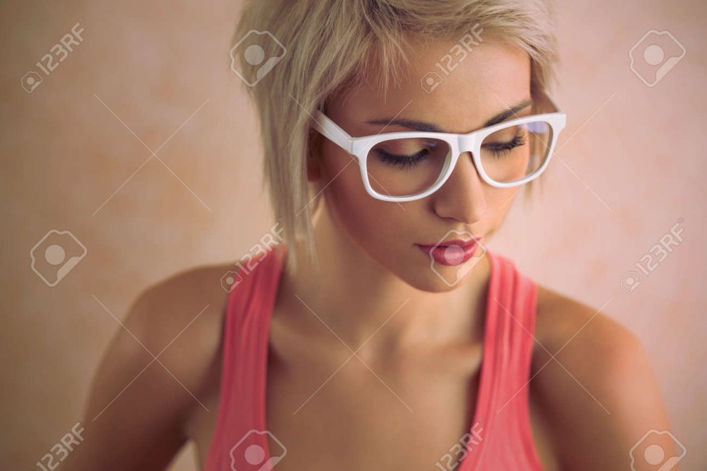 Girl blonde with short haircuts with glasses