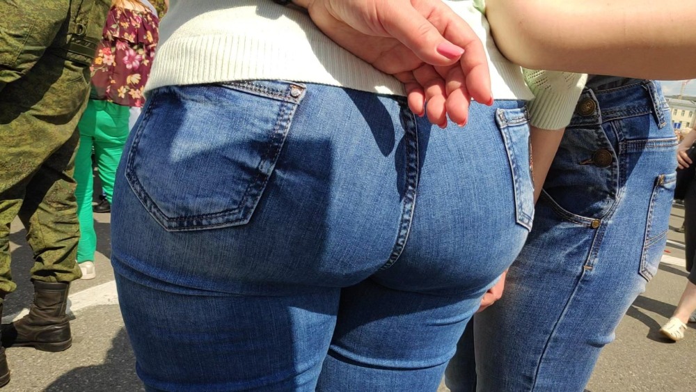 Naked butt in torn jeans