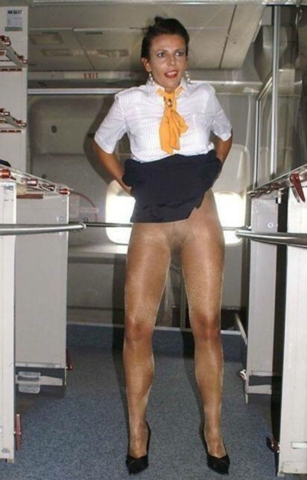 Stewardess in pantyhose without panties