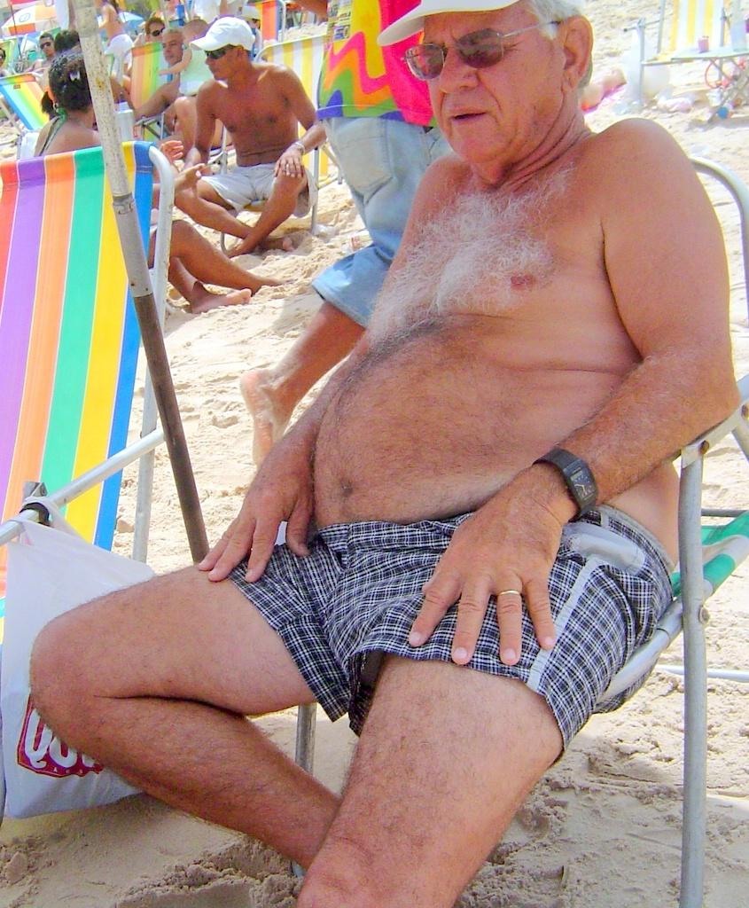 Naked elderly couples on the beach