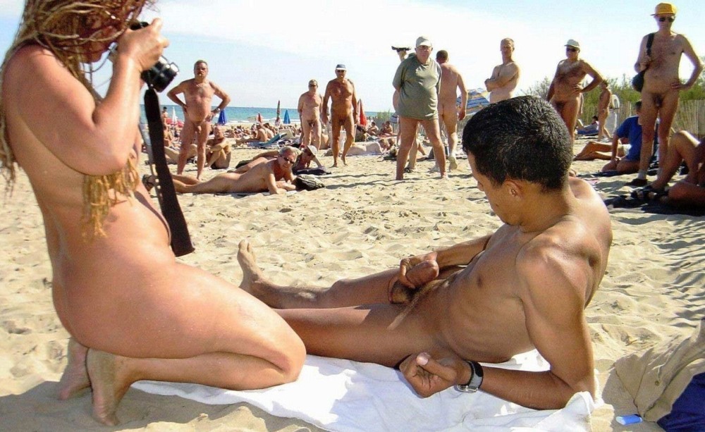 Standing penis on the beach