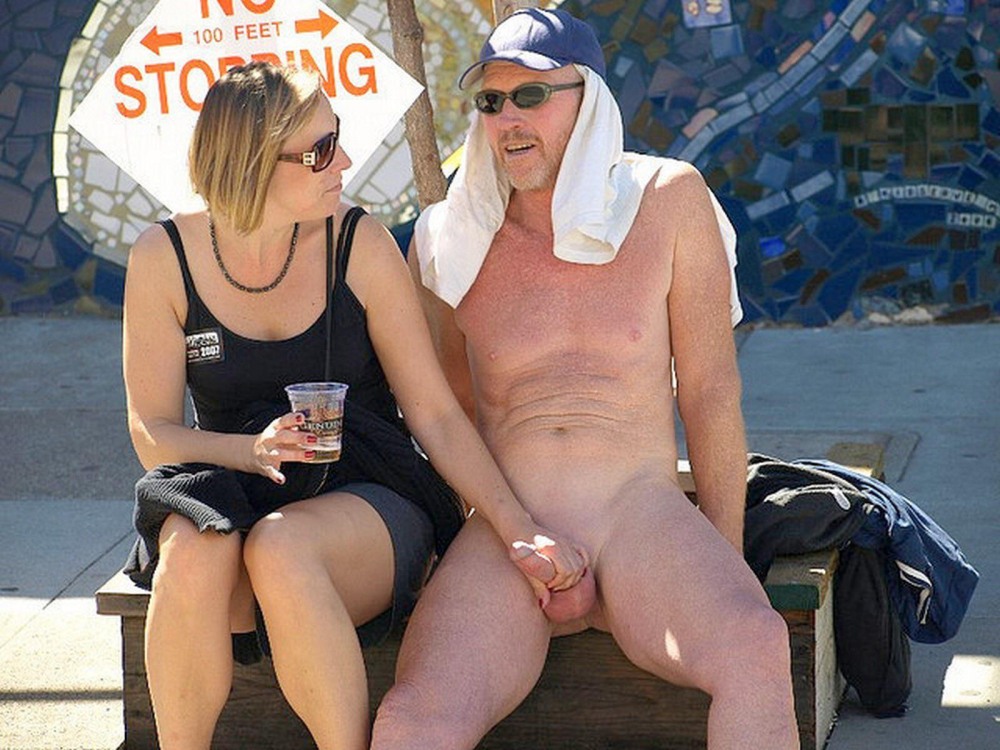 Naked men and women on the beach