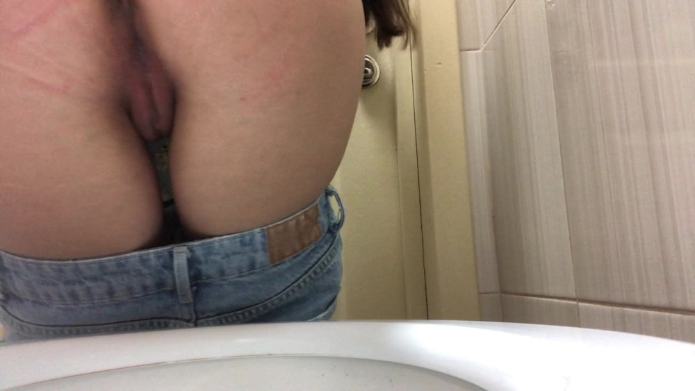 Naked asses in the women's toilet