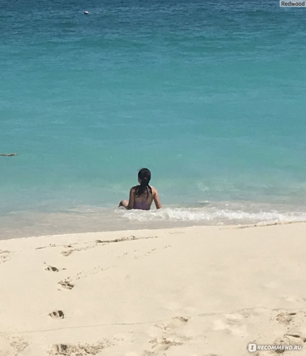 Family on the beach girls 10 years old