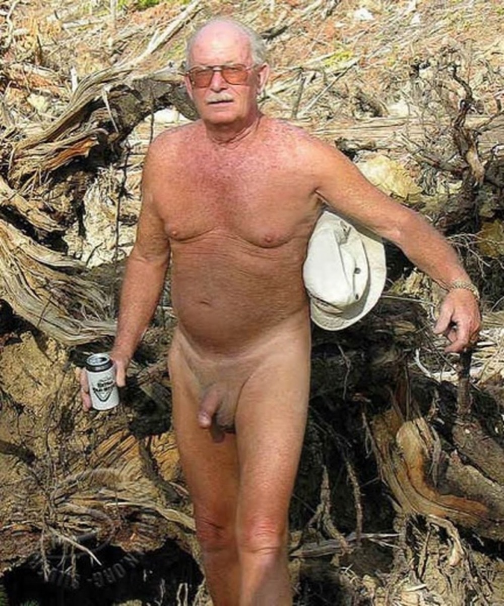 Naked guys on a nudist beach
