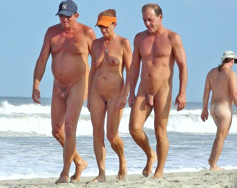 Naked surfing man