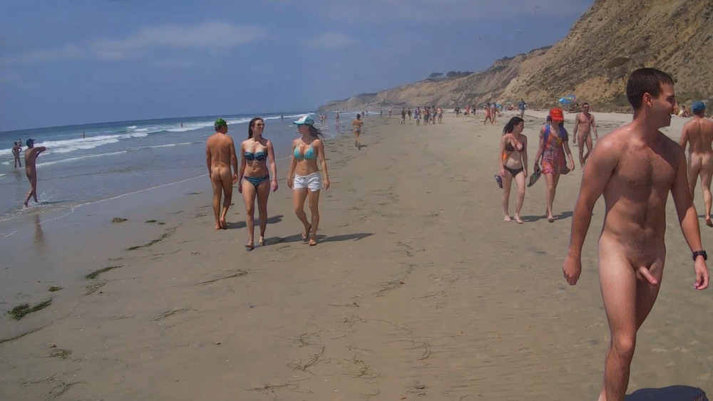 Naked pumped up guys on the beach